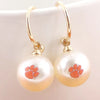 CLEMSON TIGERS GOLDTONE PEARL WITH PAW HOOP